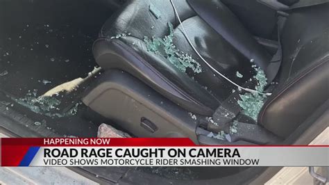 Caught on camera: Motorcyclist smashes rock through woman's window